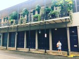 girl in front of building in the French Quarter